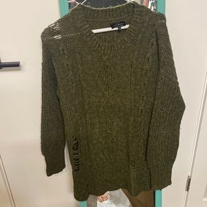 Pre-distressed sweater